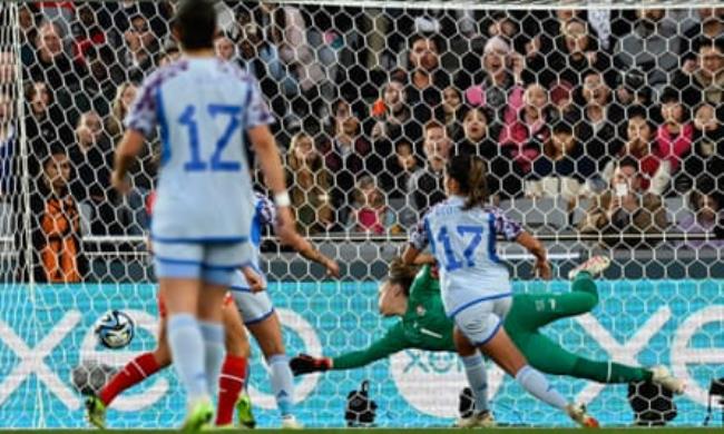 Spain's Alba Redo<em></em>ndo puts the ball past Switzerland's goalkeeper Gaelle Thalmann to score her team's second goal in the Women's World Cup clash at Eden Park.